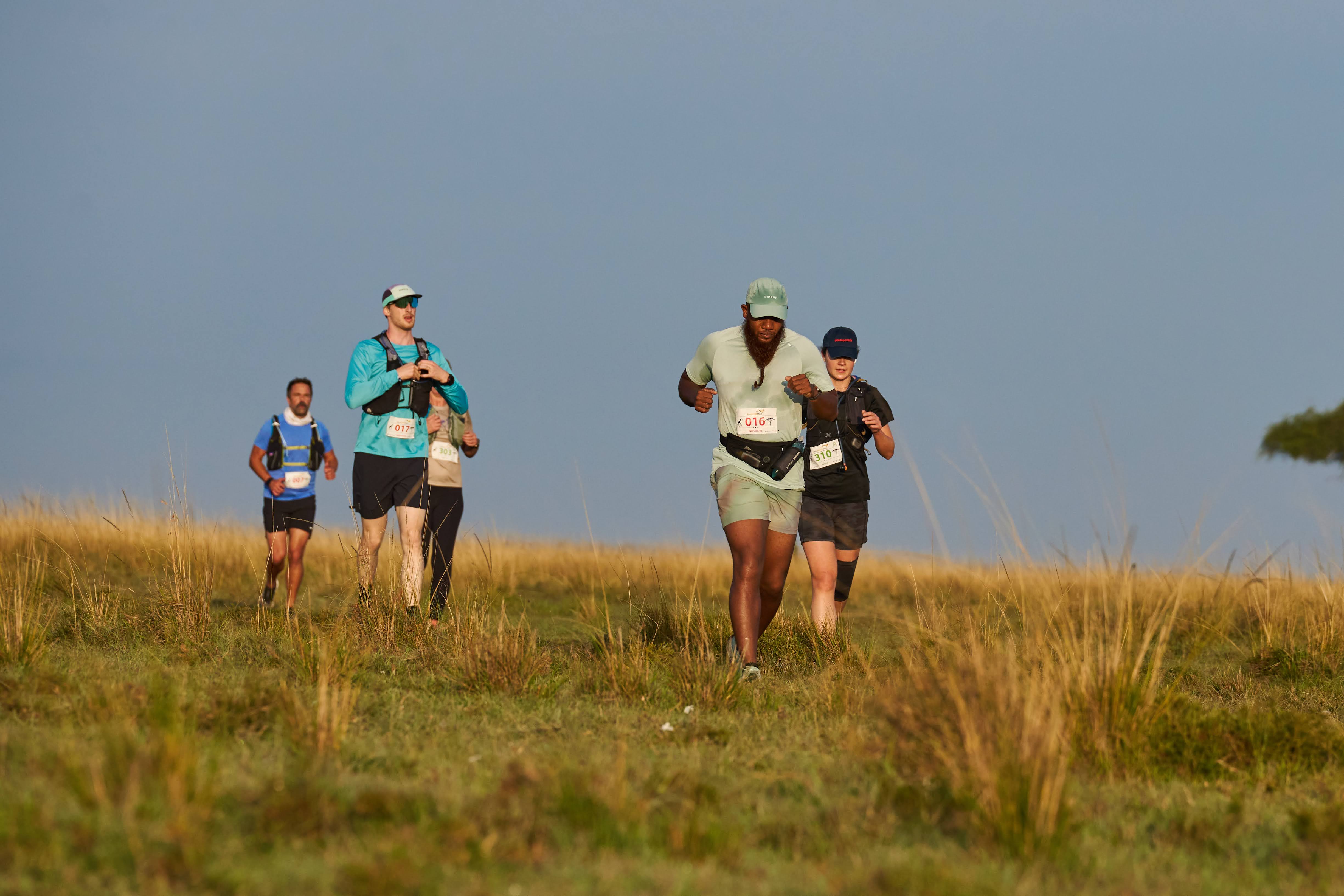 Edmund running an ultramarathon across the Maasai Mara